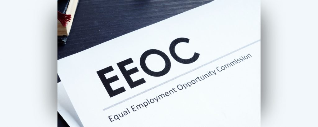 Image of the EEOC (Equal Employment Opportunity Commission) acronym printed on a piece of paper
