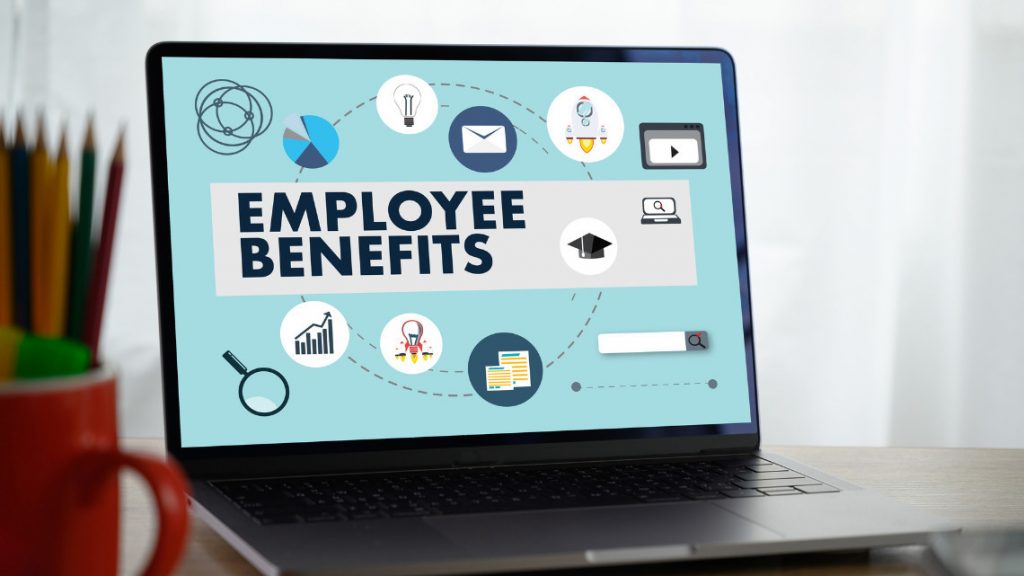 laptop with an image depicting employee benefits on it