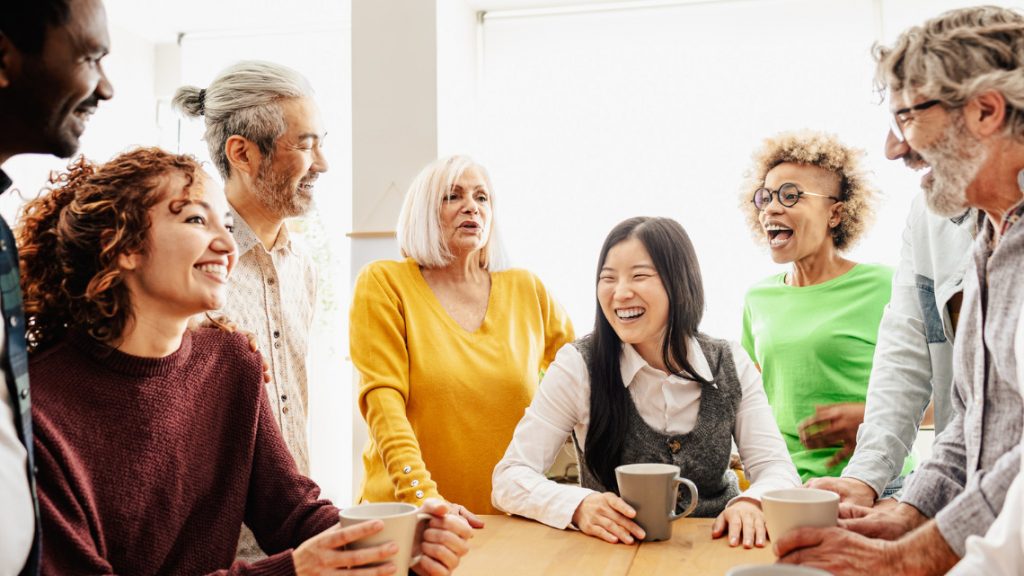 diverse group of people in the workplace representing lifers